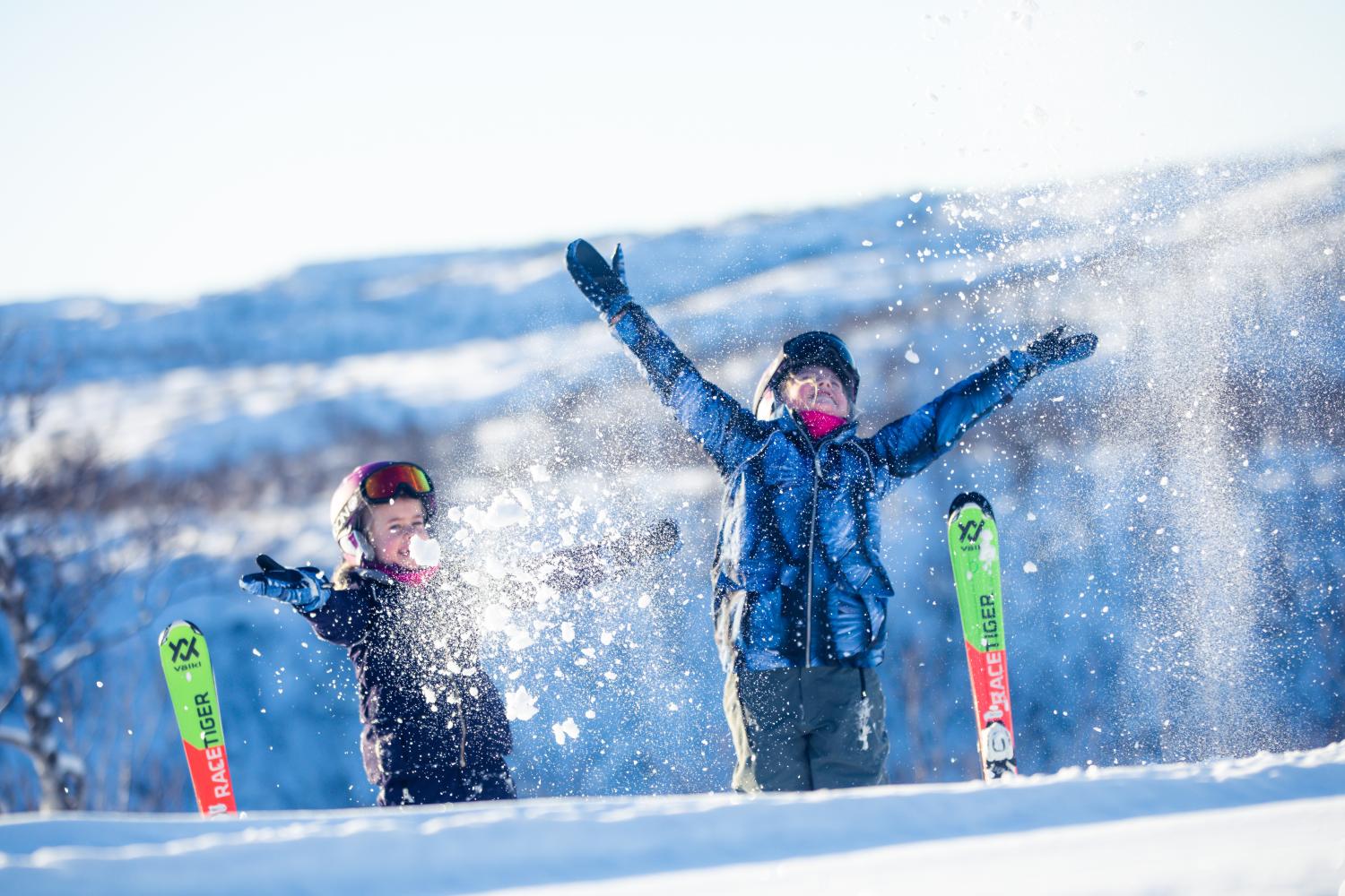 Happy kids in the slopes
