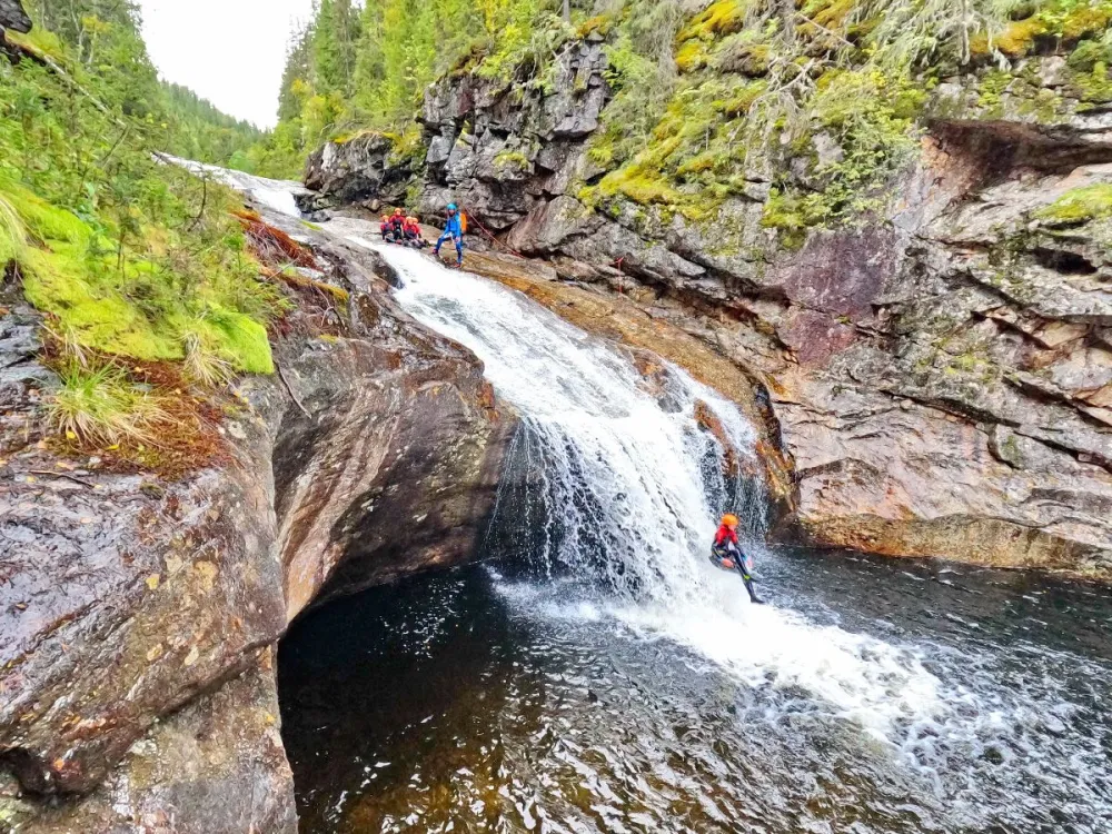 Canyoning with lunch - rappelling and sliding down pools, rapids and river gorges