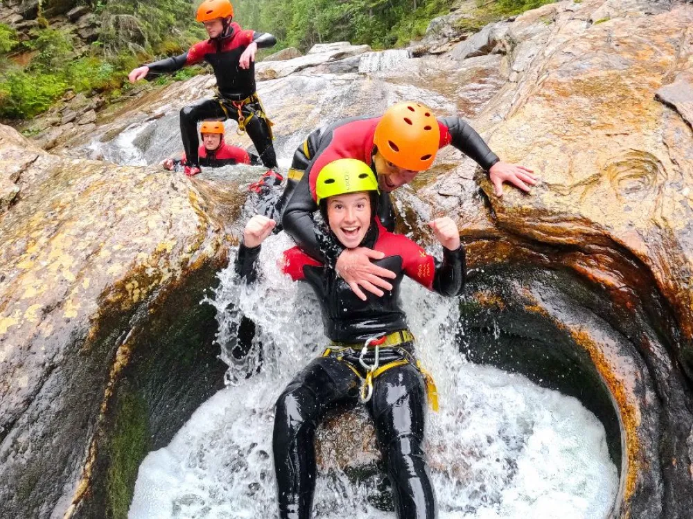 Canyoning with lunch - rappelling and sliding down pools, rapids and river gorges