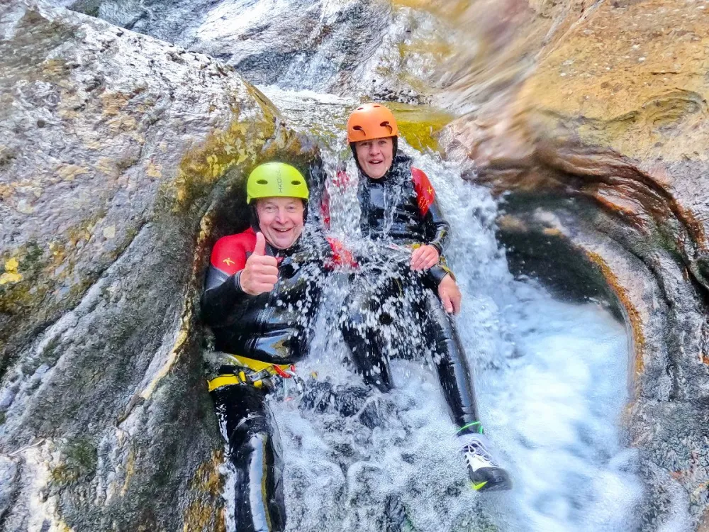 Canyoning with lunch - rappelling and sliding down pools, rapids and river gorges