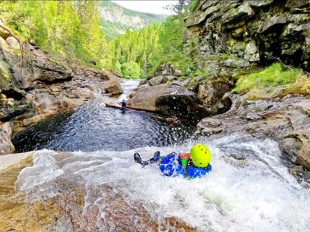 Canyoning with lunch - rappelling and sliding down pools, rapids and river gorges